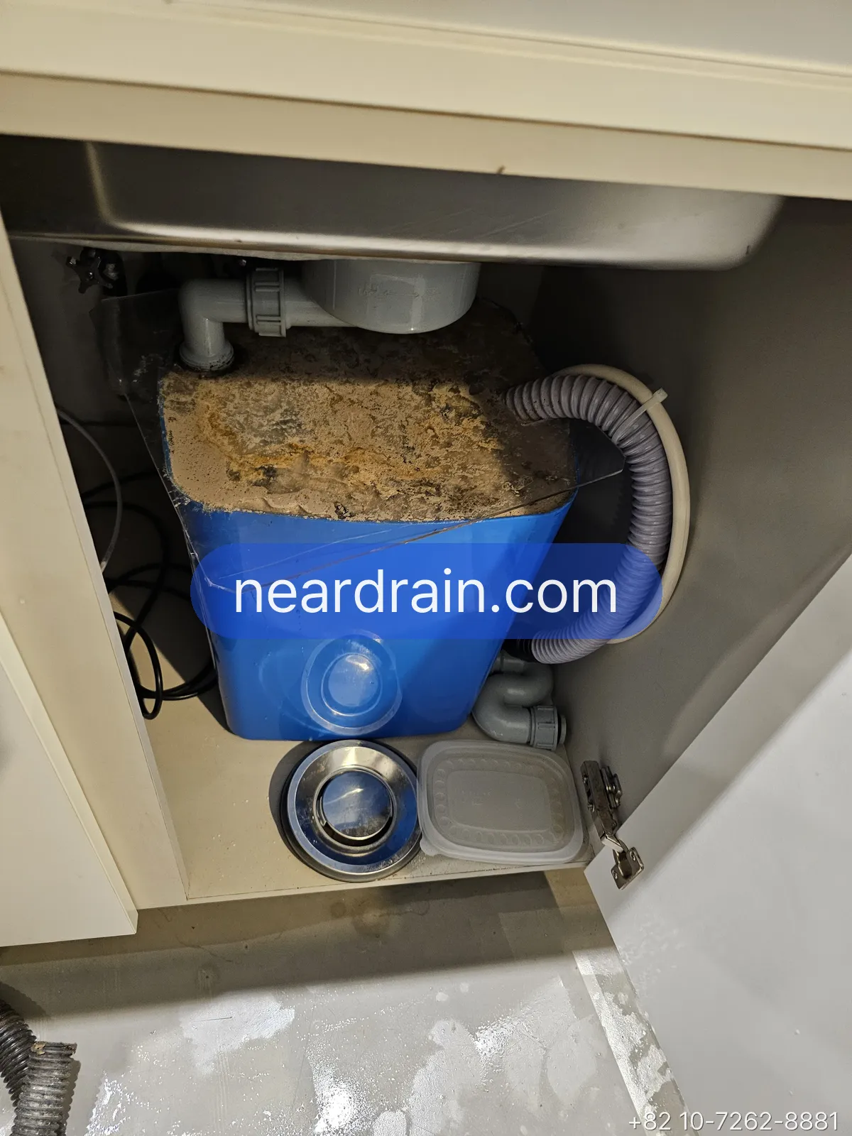 Grease build-up inside a kitchen drain line